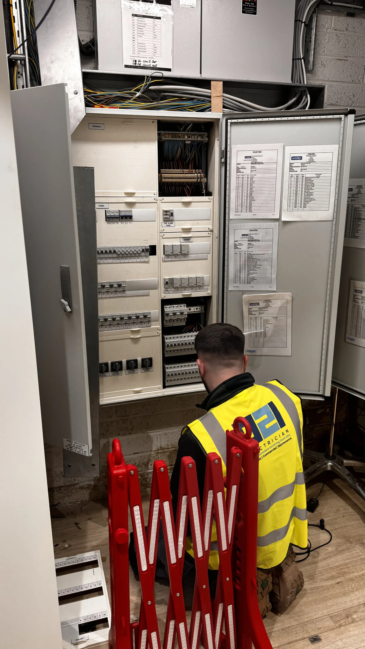 021 Electrician inspecting a commercial distribution board in Cork